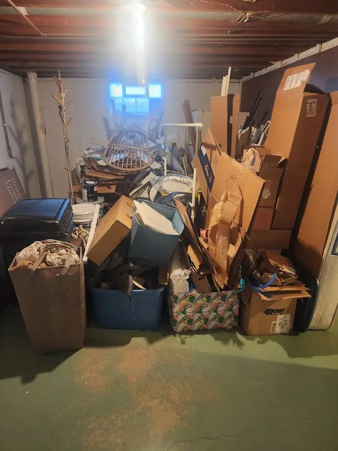 Roll-off dumpster container at job site for Concrete Dumpster Rental in Whitefish